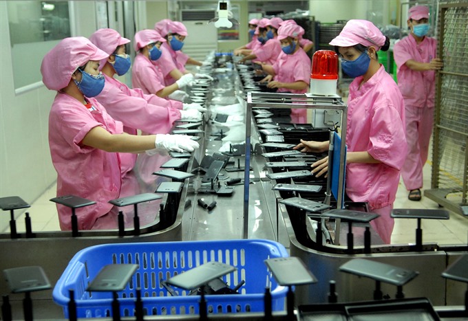 Producing smartphone covers at  Korea-invested Dawon Electronic Vina in northern Bac Ninh Province. Viet Nam remains one of Korea’s most important ASEAN bloc trading partners. — VNA/VNS Photo Danh Lam  Read more at http://vietnamnews.vn/economy/345620/asean-korea-trade-blooms.html#tr6BtsXsLH8ha8uS.99