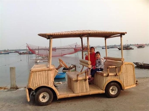 Bamboo boost: A bamboo car is developed from a battery-powered cart. The car designer and producer, Võ Tấn Tân, spent three months building the electric car into an environmentally-friendly vehicle. Photos courtesy of Võ Tấn Tân