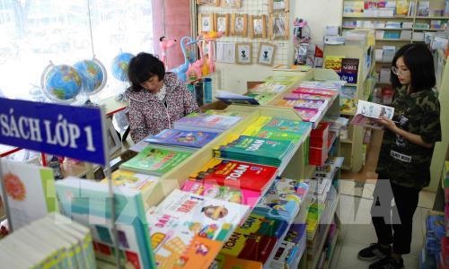 Four publishers licensed to compile textbooks