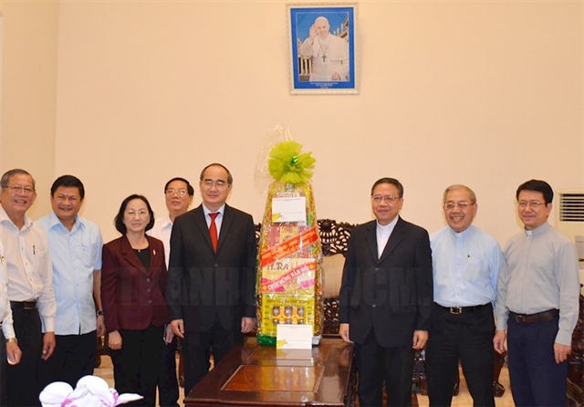 HCM City leader commends religious dignitaries during pre-Tết visits