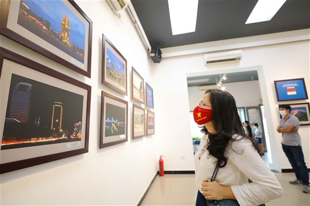 Photo exhibition on ASEAN land people underway in Hanoi