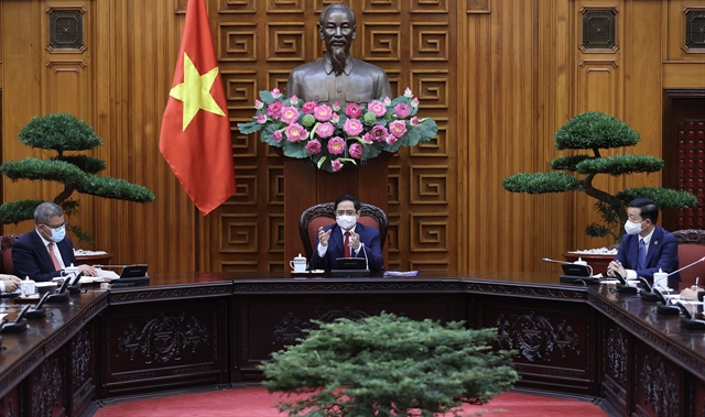 PM Chính underlines green growth in talks with British minister