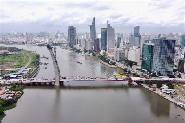 Two sides of downtown HCM City bridge linked up
