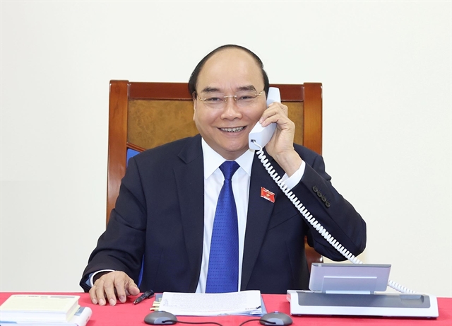 PM Phúc holds phone talks with Thai counterpart