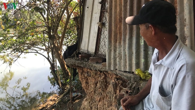 Erosion threatens homes in Tân Uyên Township