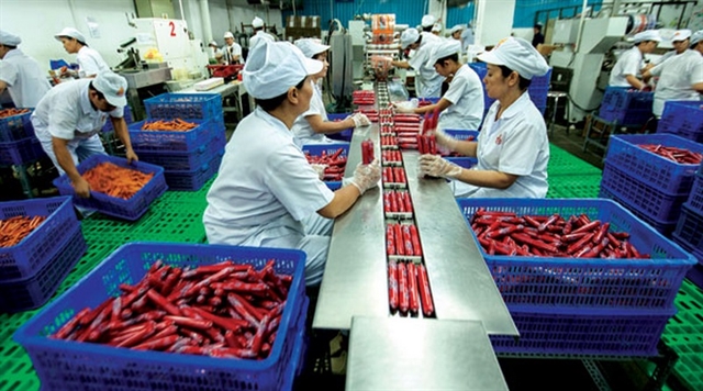Food processing firms step up production focus on safety measures for workers