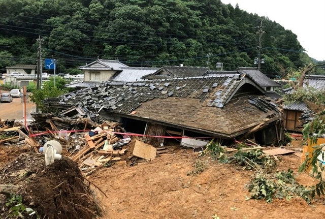 Desperate searches as dozens feared dead in Japan floods