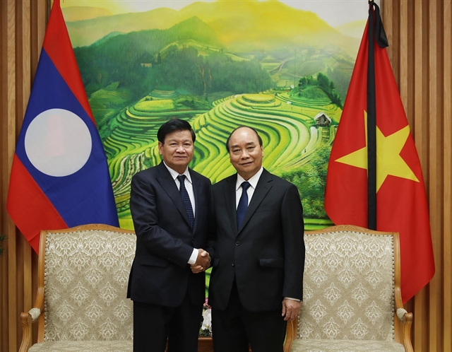 PM Phúc hosts Lao counterpart