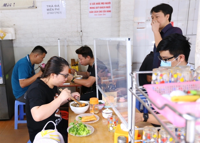 Hà Nội shuts in-person dining barbershops starting July 13