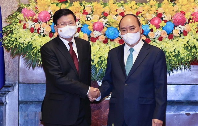 Presidents visit affirms special attention to fostering ties with Laos