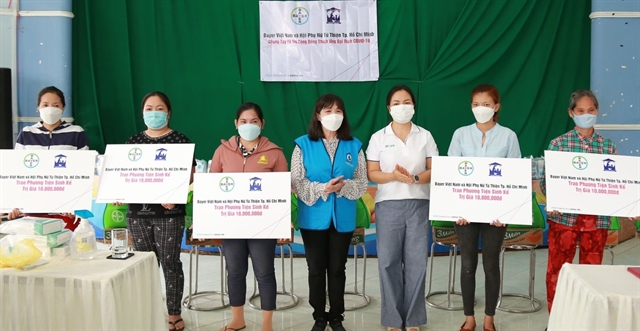 Bayer  Womens Charity Association of HCMC provide relief to COVID-affected people