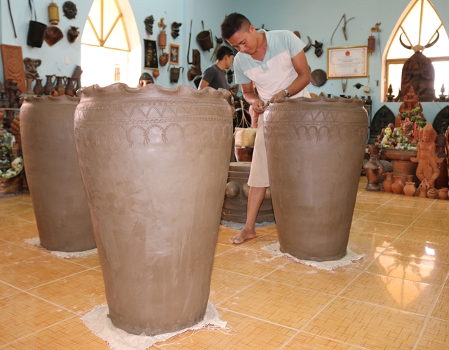Ancient pottery village seeks to keep the wheels turning