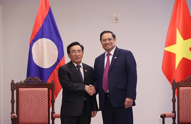 PM Chính meets with Lao counterpart in Washington