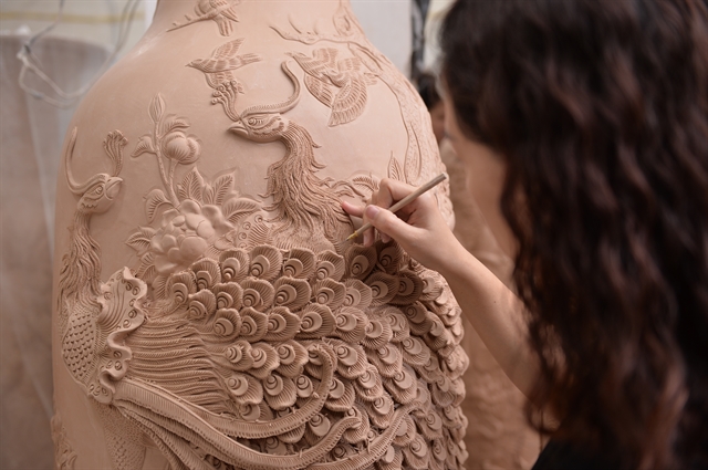 Young artisan puts trendy twist on Bát Tràng ceramics