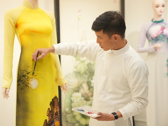 Fashion designer turns áo dài into silk artworks