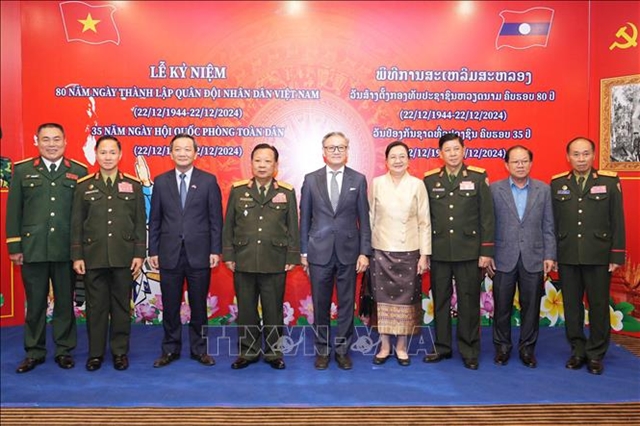 Ceremony in Laos recalls 80