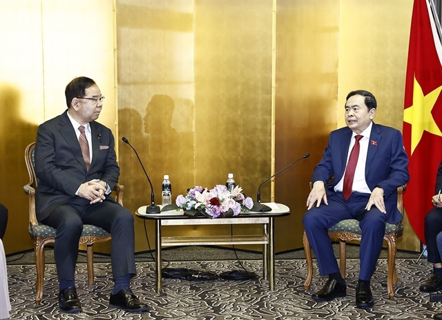 Top legislator receives leader of Japanese Communist Party