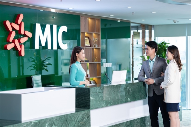 Customers at a transaction office of MIC.