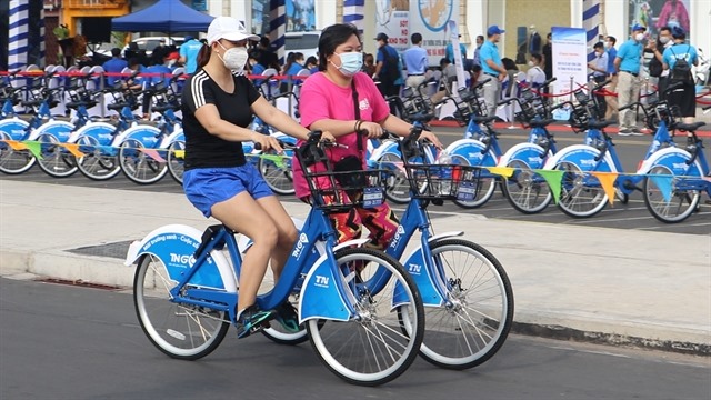 Bike rental service attracts young people in HCM City