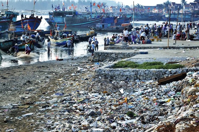 The fishing port in Quỳnh Phương in the central province of Nghệ An is awash with rubbish. — VNS Photo Việt Thanh
