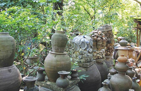 Priceless treasures: Items which have been uncovered by researcher Ho Tan Phan, found in the Huong River bed in Hue. Priceless treasures: Items which have been uncovered by researcher Ho Tan Phan, found in the Huong River bed in Hue.